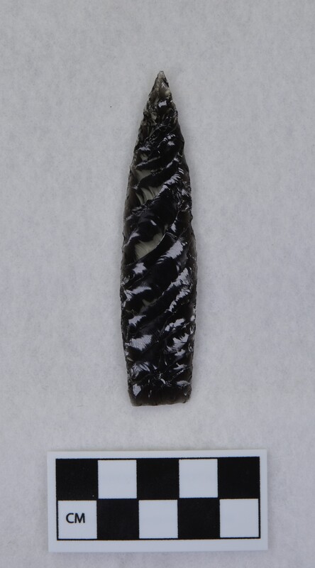 Titmus technique, parallel diagonal flaking, lanceolate style point, ground and thinned basal margins