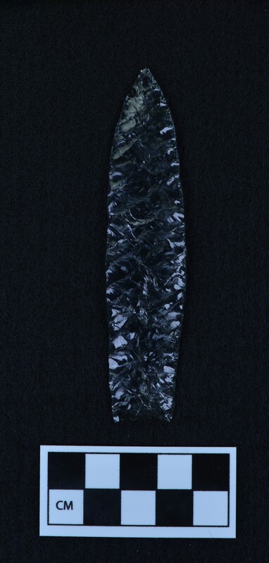 Titmus technique, parallel diagonal flaking, lanceolate style point, ground and thinned basal margins