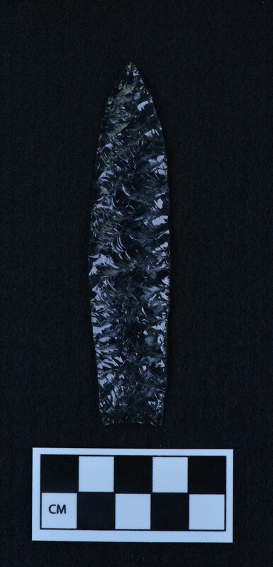 Titmus technique, parallel diagonal flaking, lanceolate style point, ground and thinned basal margins