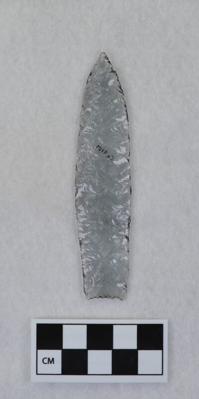 Titmus technique, parallel diagonal flaking, lanceolate style point, ground and thinned basal margins