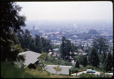 A photographic slide of a scenic overlook of a town.