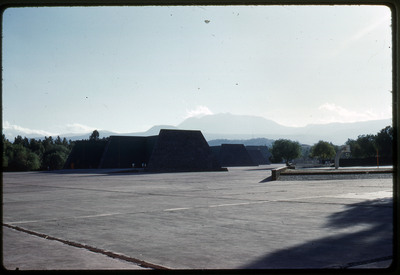 A photographic slide of an urban campus with geometric buildings.