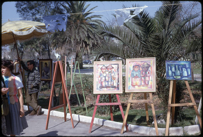 A photographic slide of an outdoor art gallery.