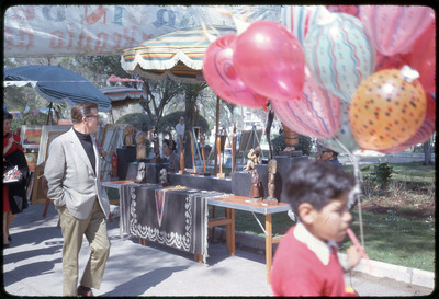 A photographic slide of an outdoor art gallery.