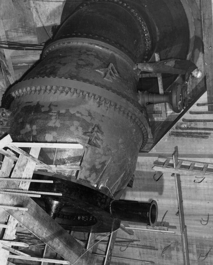 41 degree, cast steel elbow, installed between penstock reducer section and needle valve in bay R-9 of the right powerhouse at Grand Coulee Dam. Eight needle valves, each having an 84-inch discharge, are being installed in the right powerhouse. The portion of the Columbia River stream flow not used through the turbines in the left powerhouse, is to be passed through the needle valves installed in the right powerhouse during the low water season. This plan will eliminate the use of the spillway during certain months of the year, assuring a minimum of turbulence in the water downstream from the dam, to facilitate necessary repairs to the concrete spillway bucket.