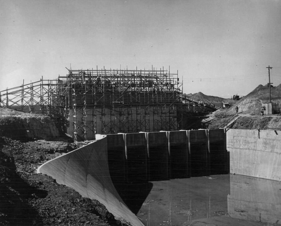 South Coulee Dam--Main Canal Headworks--View taken from east bank of the approach channel showing the falsework for construction of the gate section of the headworks.