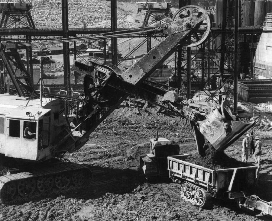 A 5-yard electric shovel, 10-yard dump buggy and 75 H.P. diesel Caterpillar used for excavating in the west side river diversion channel