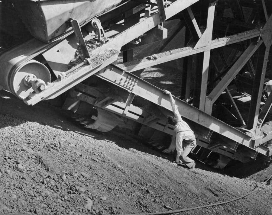 Closeup of Guntert and Zimmerman trimmer being used by Winston-Utah on East Low Canal. Photograph taken especially for Popular Mechanics Magazine. Photographer: F. B. Pomeroy