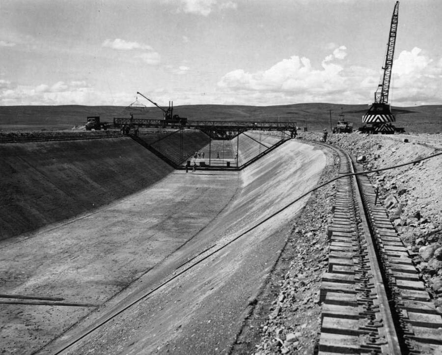 West Canal, Specs. 1286, Winston-Utah Co, Reinforcing steel jumbo in middle distance and paver farthest from the camera.