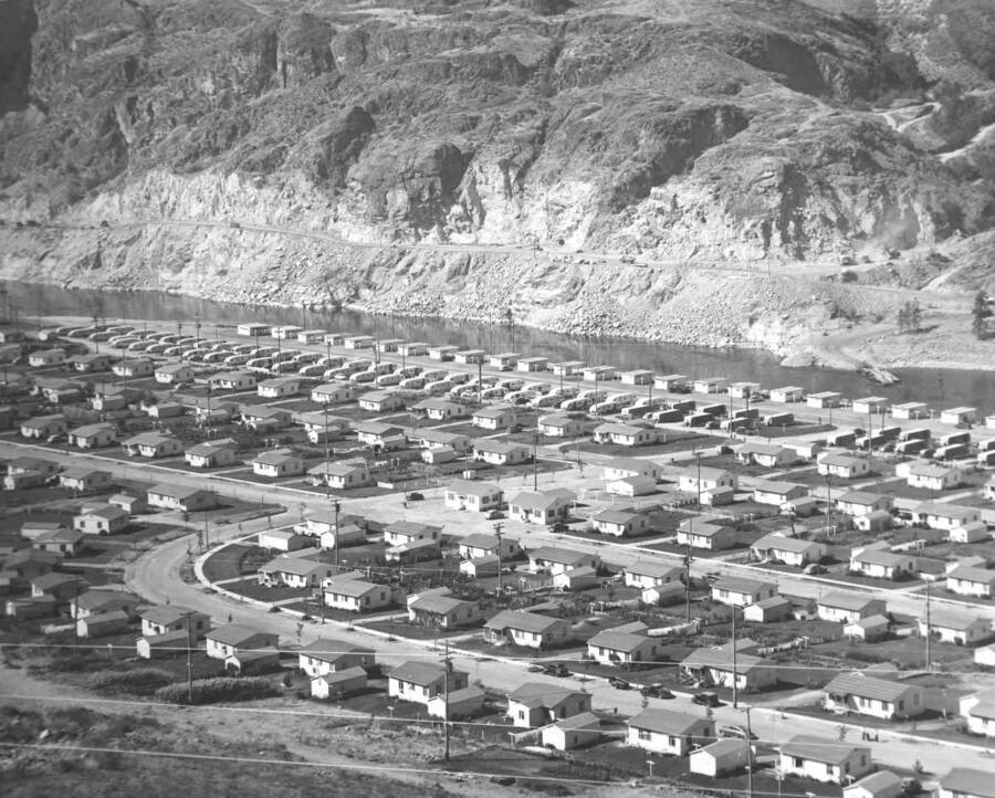 Telephoto photograph of home and yards in the Airport Addition to Coulee Dam