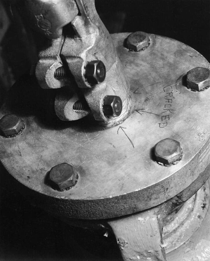 View of cracked and bent terminal stud on top of Westinghouse 230-kv bushing serial No. 3 for 36,000-kva transformers purchased under specifications No. 1025