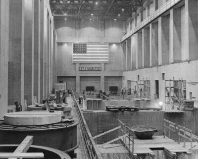 A view of the east end of the left powerhouse, with turbine pit No. 6 in the immediate foreground
