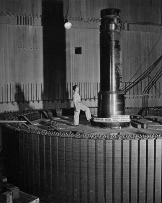 Man stands on the rotor--which nears completion