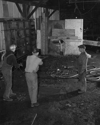 Men appear to be playing a game while on break.