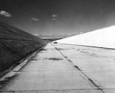 Columbia Basin Project, Irrigation Division, Main Canal. General view of completed section of Main Canal, looking west (downstream). H. Foss, photographer.