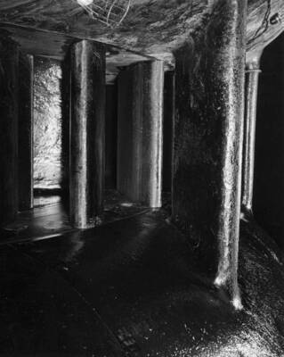 Painted surface of scroll cast--turbine L-2. This view shows the condition of the paint in the scroll case and guide vanes of the speed ring.