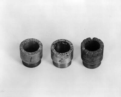 close up view of three diamond core drill bits