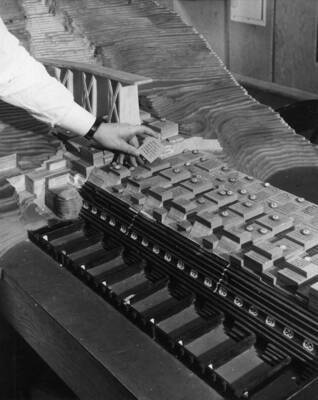 Man works on three dimensional model