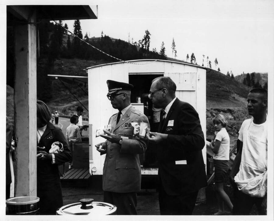 At ground-breaking program several civic groups got together & furnished hot dogs. Mr. Curtis & Col. Hyzer are shown.