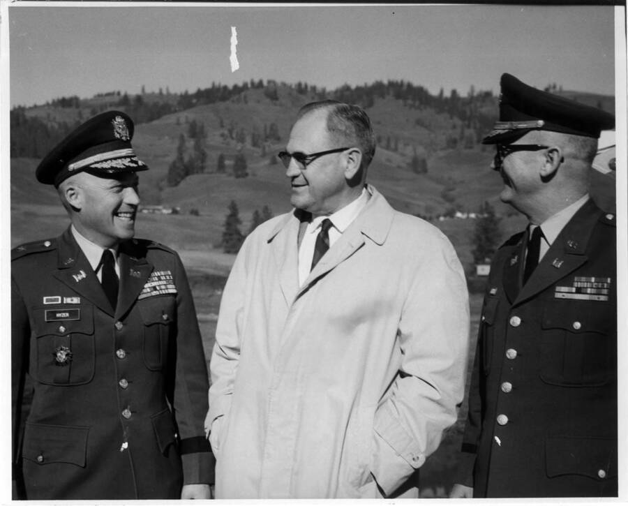 Gen. Hyzer & Col. McElwee at Orofino Airport. They frequently came in for conference. Also shown is A.B. Curtis, Mayor of Orofino