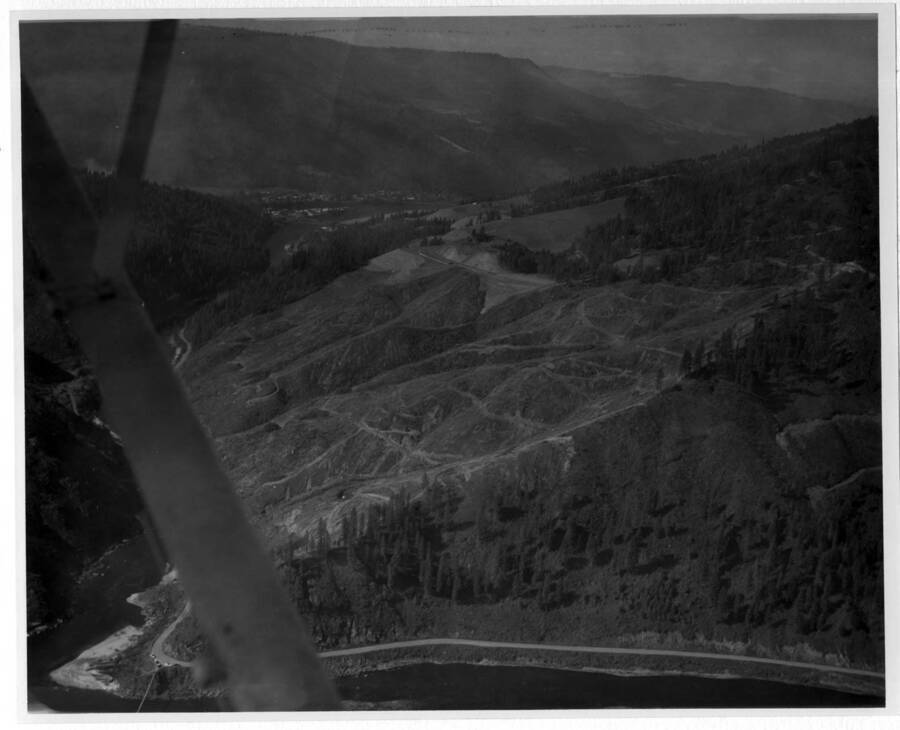 Aerial view of site. Clearing for dam location has been done- Orofino in distance.