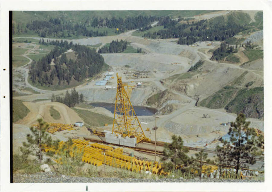 Photograph taken in May, shows a cable tower and below the coffer dam is the constructors repair location.