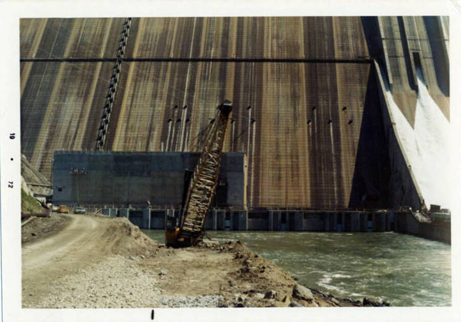 Photograph showing the spillway & the powerhouse under construction.