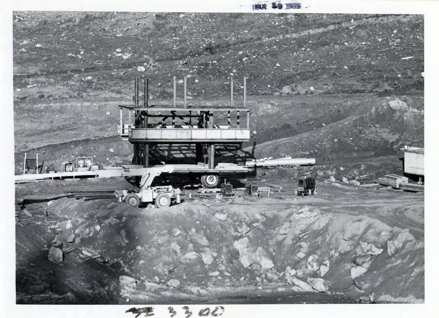 Photograph shows a tunnel bore machine under construction.  This machine, built on the job, in 1965 was used to drill the diversion tunnel through about 2,500 ft. of soloid granite rock.