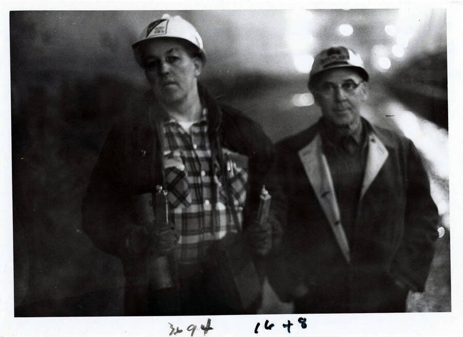 Photograph of a couple of workers who work on the diversion tunnel.