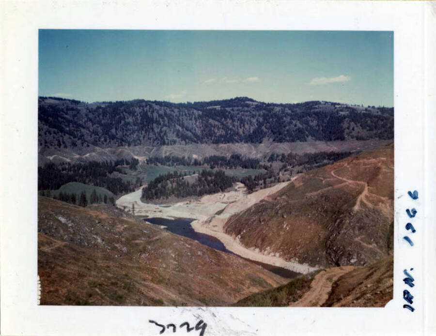 Photograph of a view of the dam site in 1966.