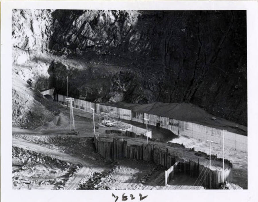 Photograph showing water going through the mouth of the diversion tunnel.