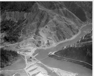 Aerial view of site before diversion tunnel & other work got underway. You can see the foot bridge & road upstream to location.