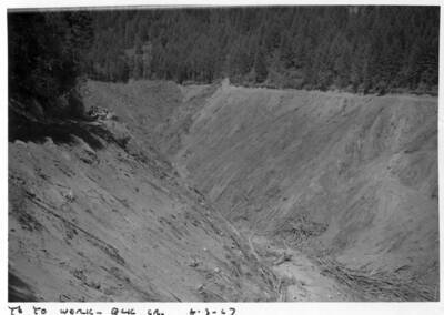 Yo yo operation. The cat has a brush blade to get the debris & not dirt. Note on image: ""Yo yo work - Elk Cr. 8-3-67""