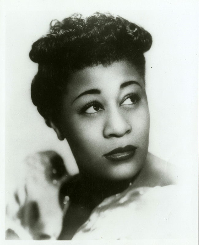 Black and white photographed portait of Ella Fitzgerald.