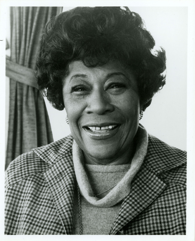 Black and white photographed portait of Ella Fitzgerald.