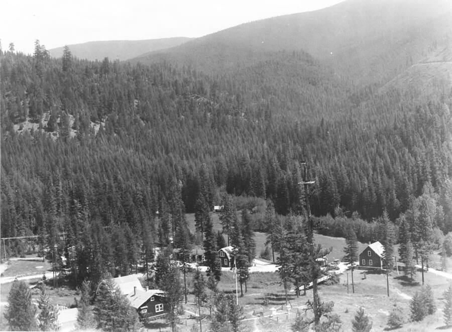 Photo taken from weather tower, "1935" written on back, center right is weather tree with instrument platform.