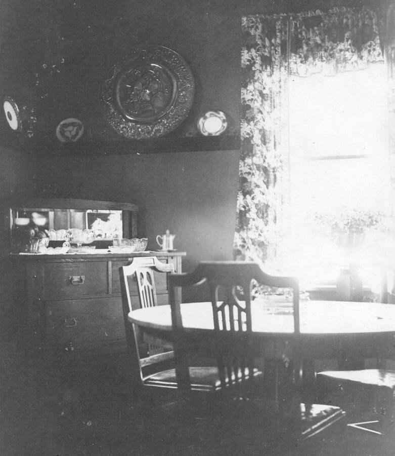Photograph of the dining room of one of the cabins at the Priest Creek Experimental Forest Headquarters.
