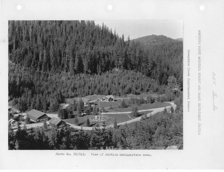 Overview of headquarters; from a series of mounted photos of buildings and other features of Deception Creek Experimental Forest, Moscow # 653-663.  All photos filed in Deception Creek Experimental Forest Box #1.  Due to the remoteness of this site, the Research Station was unable to keep a full-time employee on the site; vandals and thieves took over and by about 1978, all buildings were removed.