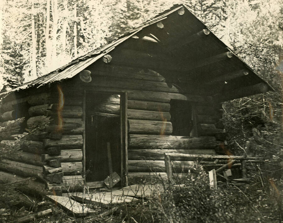 Photos series of the buildings found on the Arthur Demorest claim, settled 1906 near the mouth of Demorest Creek. Photos are glued to black kraft paper and hanging in the 3rd floor hallway, Moscow Forest Sciences Laboratory. These photos appeared in the 1936 Annual Report. No other descriptions available.