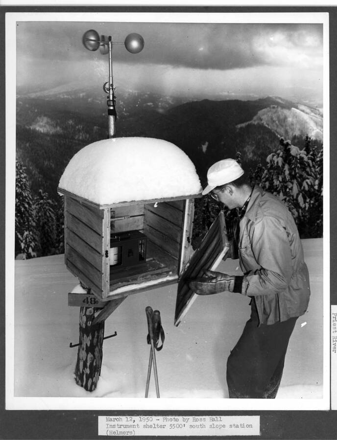 March 12, 1950 - Photo by Ross Hall. Instrument shelter 5500' south slope station. Helmers pictured.