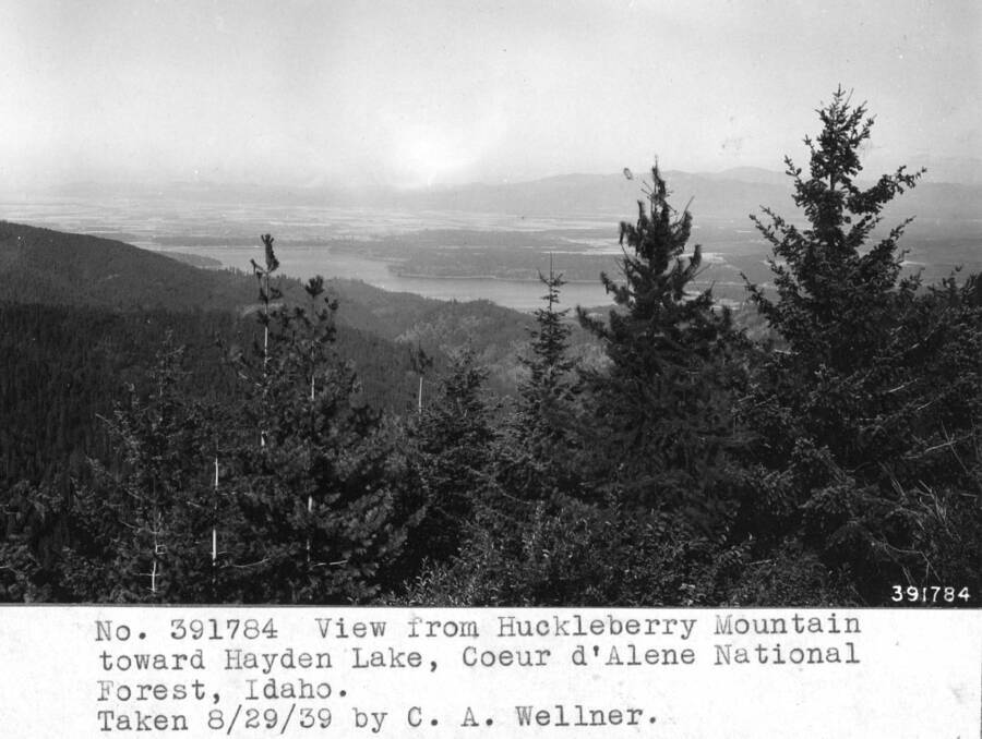 View from Huckleberry Mountain toward Hayden Lake, Coeur d'Alene NF, Idaho. Taken 8/29/39 by C.A. Wellner.