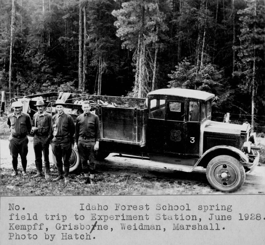Idaho Forest School spring field trip to Experiment Station, June 1928. L-R G. Kempf (Ranger), R.W. Weidman (Station Director), H.T. Gisborne (Fire Researcher), and Bob Marshall (Junior Forester). Filed in Priest Creek Experimental Forest box #4.