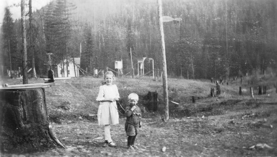 Margaret Larsen and Hansie Kempff, son of Gerhardt Kempff the Ranger and Superintendent of Priest River Experimental Station. Photo looking south to the weather station and original office/lab. The Kempff family arrived at Priest River Experimental Station in 1918.  Hansie was the first and perhaps only child born at Priest Creek Experimental Forest.