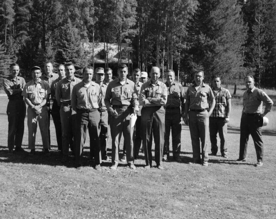 Rexford Daubenmire, Botanist Washington State University, developed the system of habitat typing in the northern Rocky Mountains to predict site characteristics, site quality, and potential climax vegetation.  He conducted training for Forest Service personnel in the identification of climax vegetation and use of habitat types for forest management.  From left, Daubenmire, Boyd, Dedan, Foiles, Kardos, Chehok, Summerside, Rehfeldt, Kelhamek, Swanger, Steinhoff, Olson, Brown, Weistemer, Coffen, Carpenter, Deitschman (photographer).