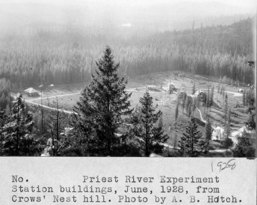 Filed in Priest Creek Experimental Forest Photo box #4: "Priest River Experimental Station buildings, June 1928, from Crow's Nest hill. Photo by A.B. Hatch, U of Idaho Forest School."