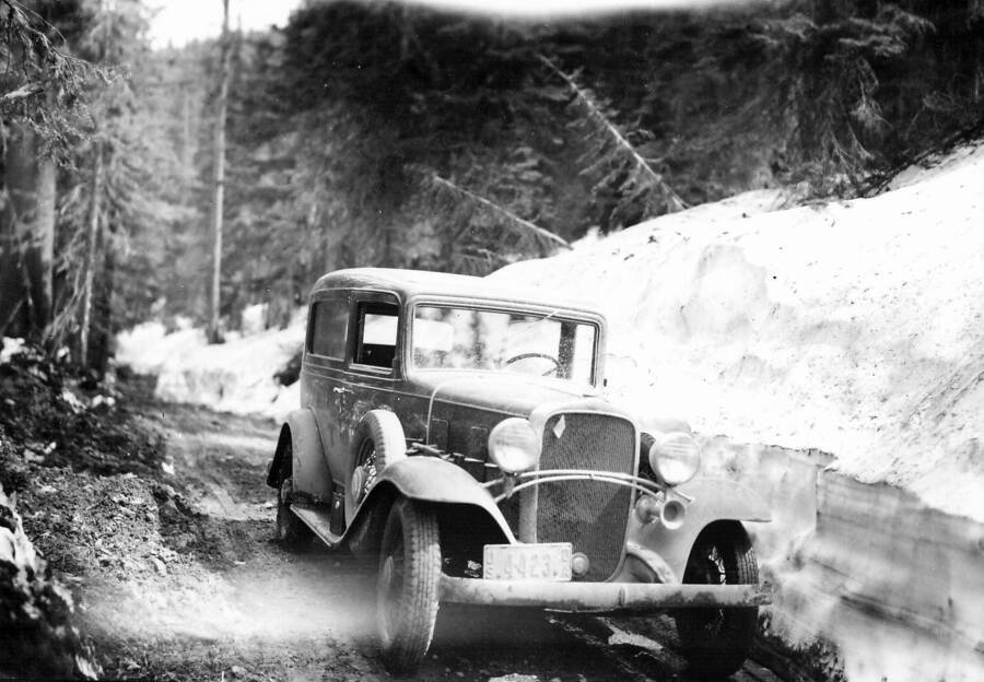 Unknown date, photographer, or owner of the car.  Assume the photo was taken at Priest Creek Experimental Forest.