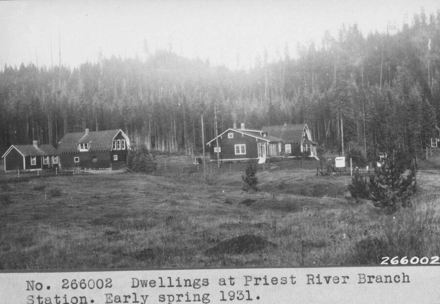 Dwellings at Priest River Branch Station. Early spring 1931. Includes cottages, lecture hall/woodshed, and weather station.