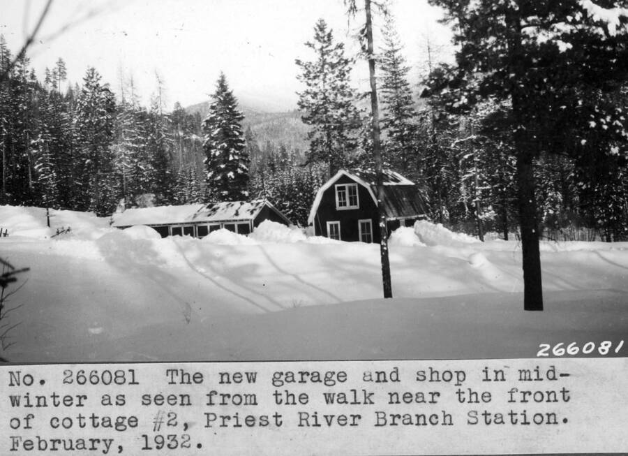 Filed in Priest Creek Experimental Forest Photo box #4: "The new garage and shop in mid-winter as seen from the walk near the front of cottage #2. PR Branch Station. February 1932."