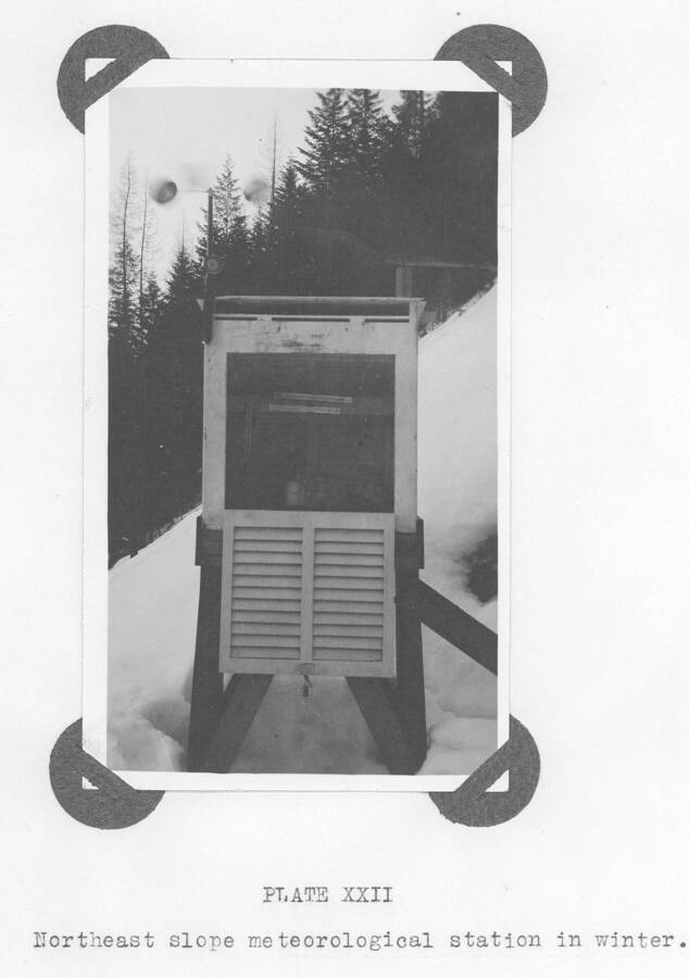 Plate XXII caption: "Northeast slope meteorological station in winter."