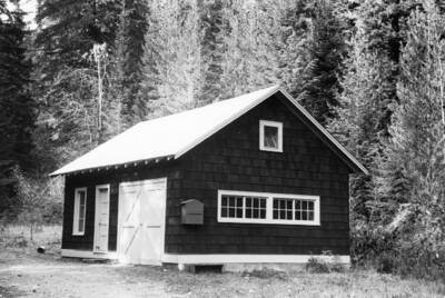 Back of photo reads:"Deception Cr. Expt Forest, 10/28/64, shop."